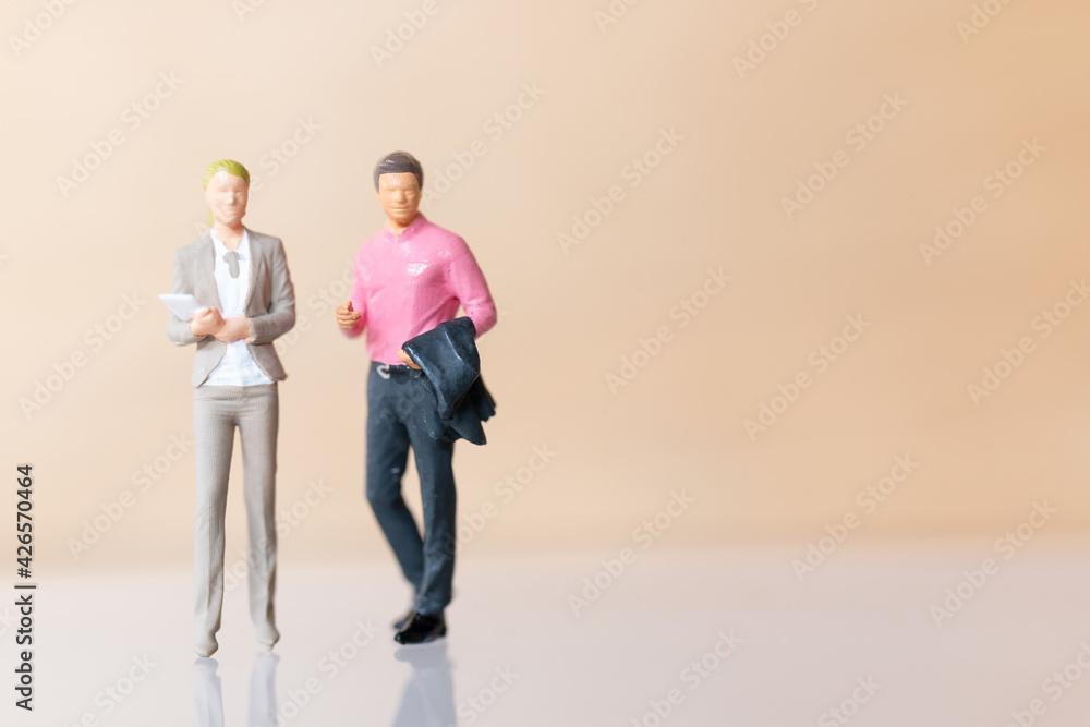 Miniature Business people standing and copy space for text Miniature Business people standing and copy space for text