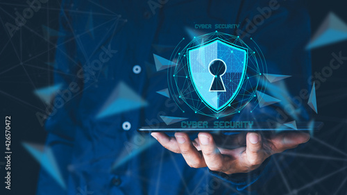 Data or network protection, business people press shield icon, virus security. Data protection and insurance Business security concepts, information security against virus. binary number 1010.