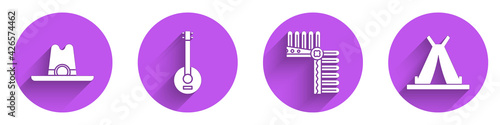 Set Western cowboy hat, Banjo, Indian headdress with feathers and Indian teepee or wigwam icon with long shadow. Vector