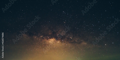 Milky way galaxy with stars and space dust in the universe,It's beautiful.Is a rotating orbit in landscape thailand
