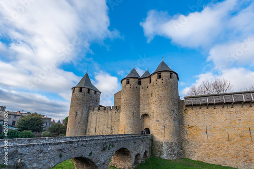 View to the entrance with the bridge and tower from the historical castle carcassone - cite de carcassone at morning
