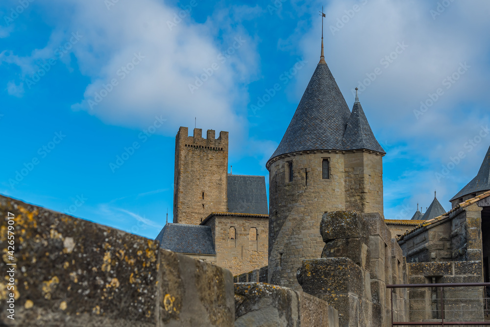 View over the historical castle carcassone - cite de carcassone - with the towers, background blue sky
