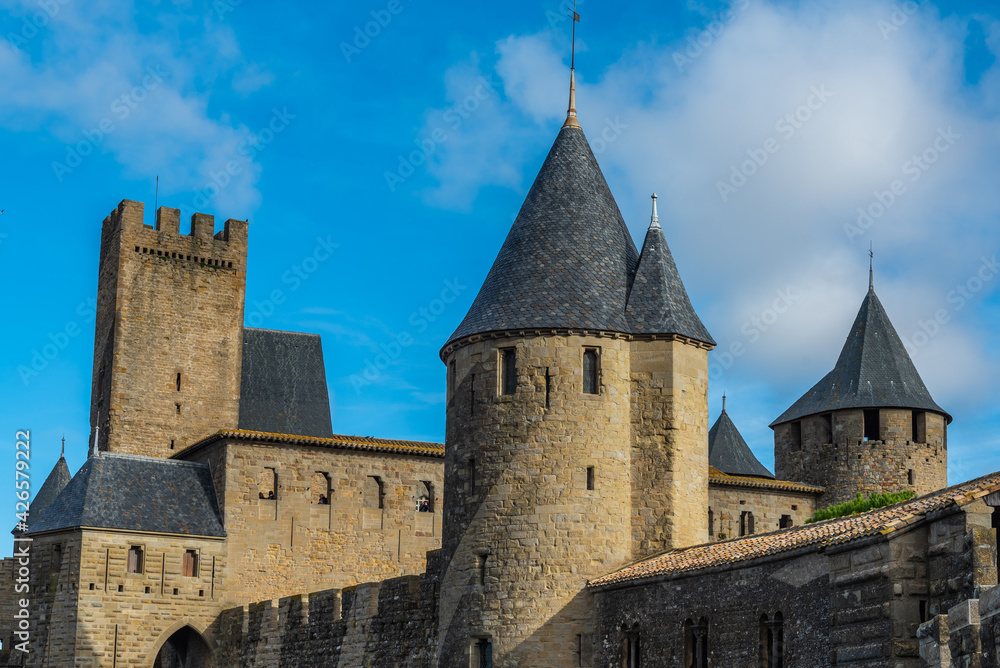 View over the historical castle carcassone - cite de carcassone - with the towers, background blue sky, close up
