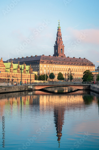 Christiansborg Palace Danish parliament building with canal water reflection in Copenhagen, Denmark