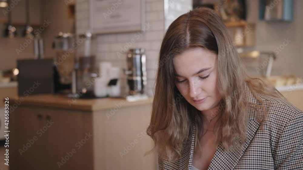 young business woman having breakfast in the hotel restaurant young business woman having breakfast in the hotel restaurant