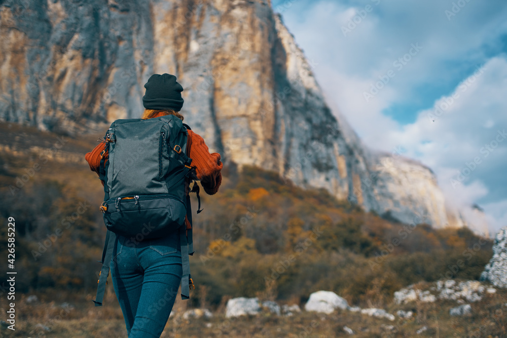 woman hiker admire nature rocky mountains travel woman hiker admire nature rocky mountains travel