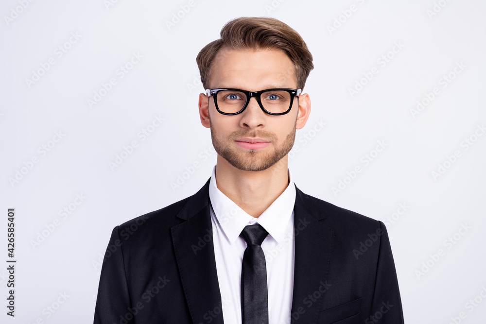 Photo of young handsome business man confident focused wear glasses isolated over grey color background