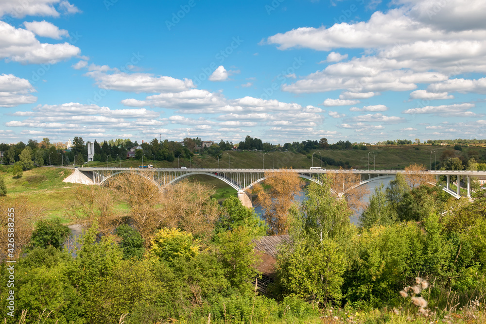 Fototapeta premium The view at the bridge across the Volga river in the town of Staritsa, Russia