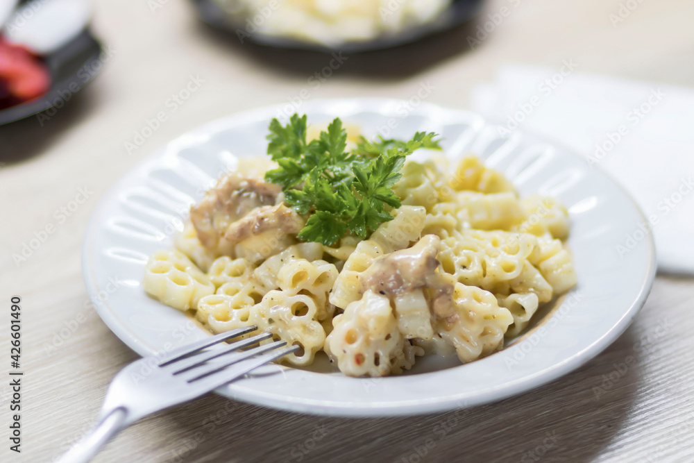 Macaroni and cheese, on the kitchen table Macaroni and cheese, on the kitchen table