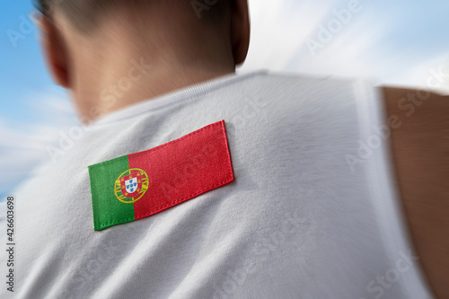 The national flag of Portugal on the athlete's back