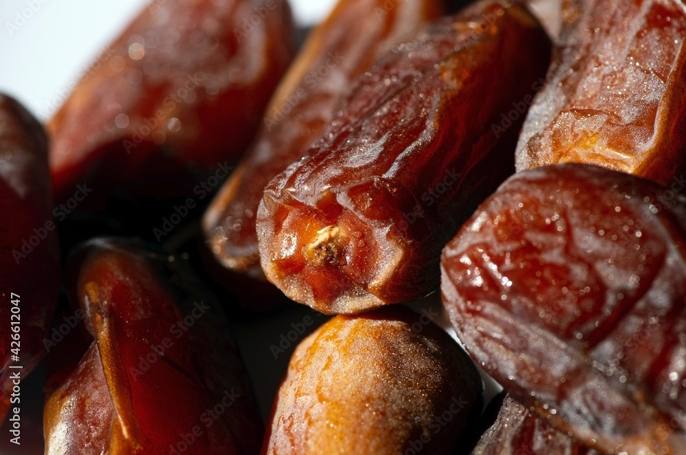 Close up of Khalas dates fruit from Saudi Arabia ready for ramadan Close up of Khalas dates fruit from Saudi Arabia ready for ramadan