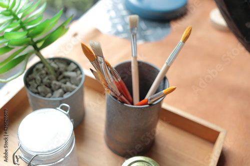 A set of paint-brush in a can