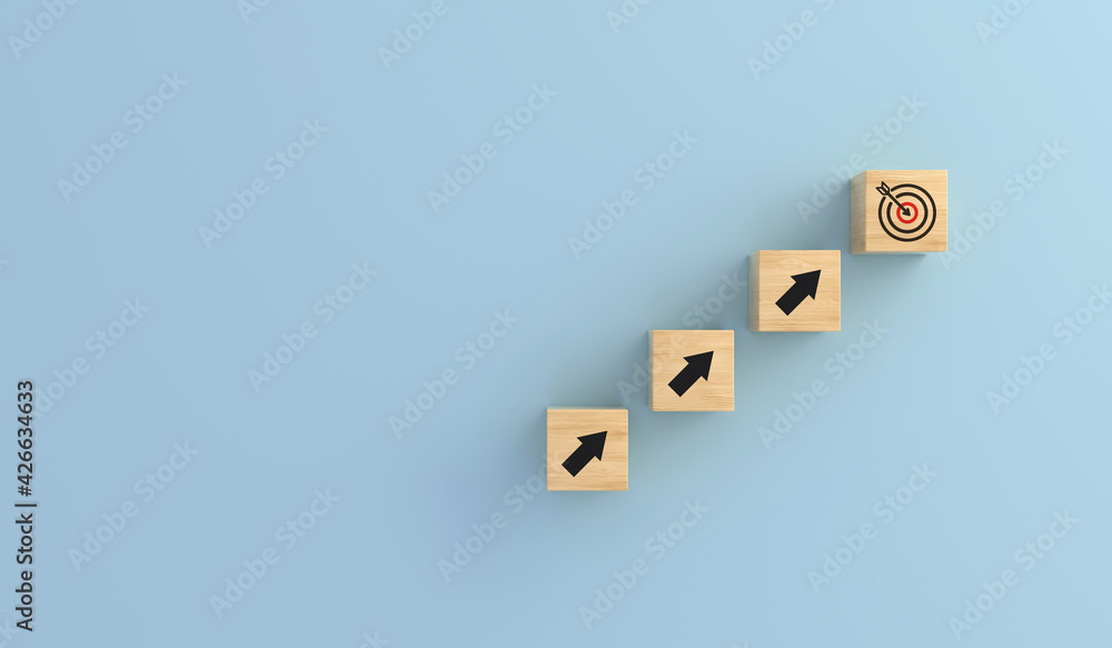 Target board wooden cube on up arrows. Target of investment and business concept growth success process. Target board wooden cube on up arrows. Target of investment and business concept growth success process.
