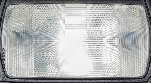 Flash light of a camera with colorful color foils photographed in the studio