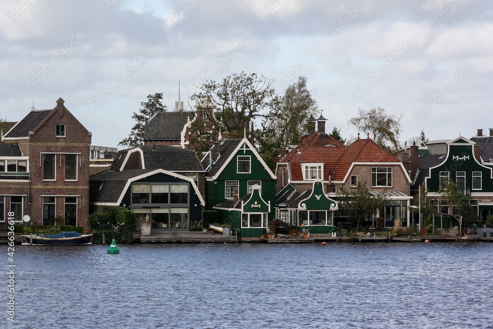 View of the village of Zaanse Schans, in the Netherlands, on the bank of the river Zaan.