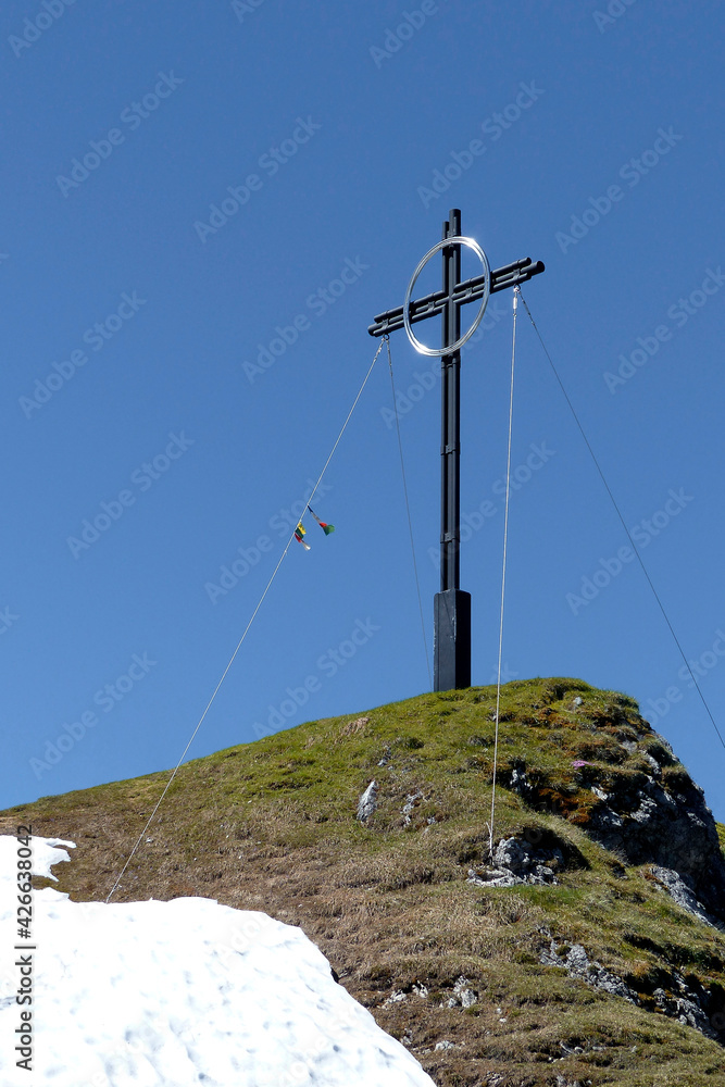 Summit cross Reither Spitze mountain, Nördlinger Hütte in Tyrol, Austria