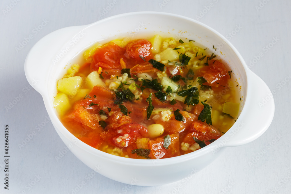 Tomato soup with beans and spices. Delicious vegetarian soup. Tomato soup with beans and spices. Delicious vegetarian soup.