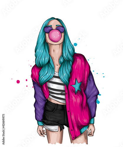 A beautiful girl in stylish clothes and with chewing gum. Fashion, style, clothing and accessories.