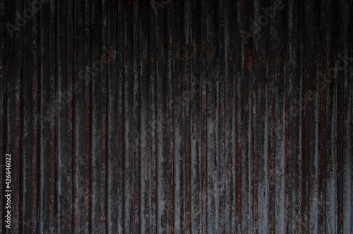 Wave abstract texture of a rusty iron wall.