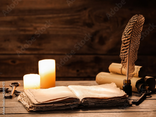 Old book with scrolls, feat...