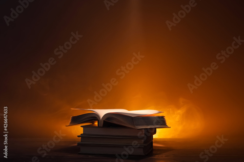 Old books on table against ...
