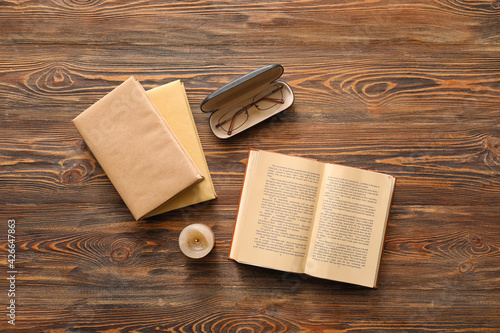 Old books with candle and e...