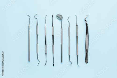 Dentist's tools on color ba...
