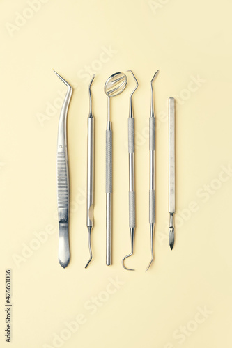 Dentist's tools on color ba...