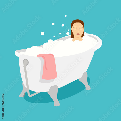 Woman relaxing in bath with foam bubbles