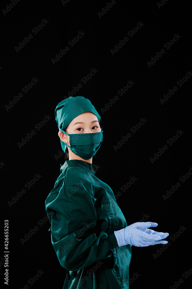 Portrait of a young female surgeon, bust