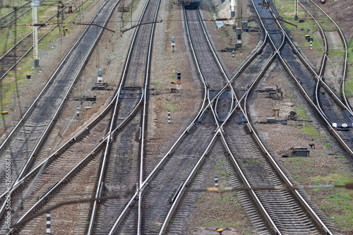 Many railway tracks intersect to form a pattern.