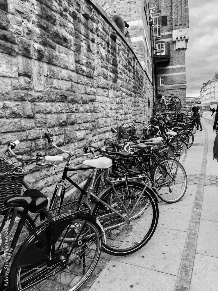 bikes lined up on a wall