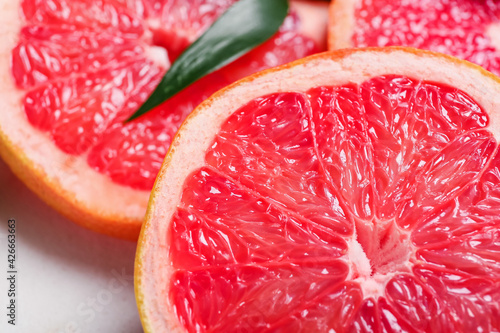 Slices of ripe grapefruits, closeup