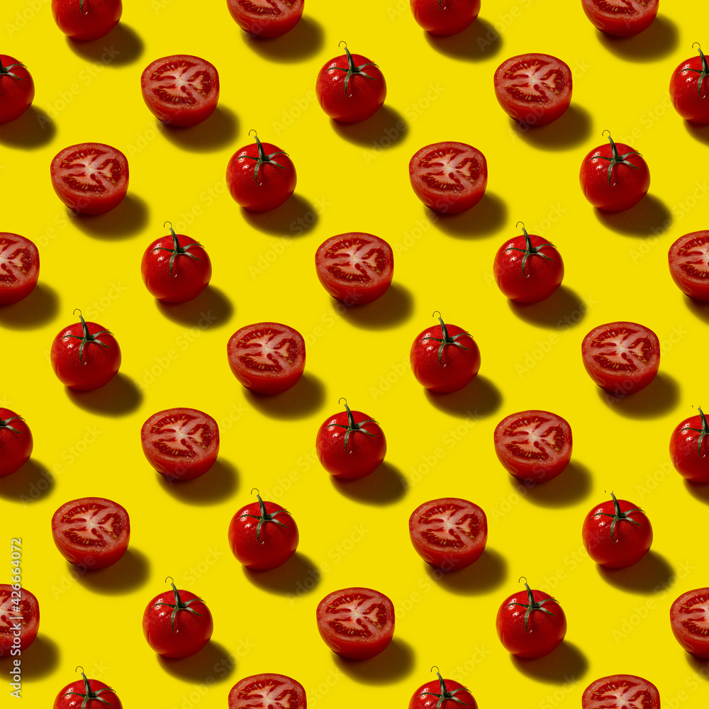 Pattern of red tomatoes on a yellow background Pattern of red tomatoes on a yellow background
