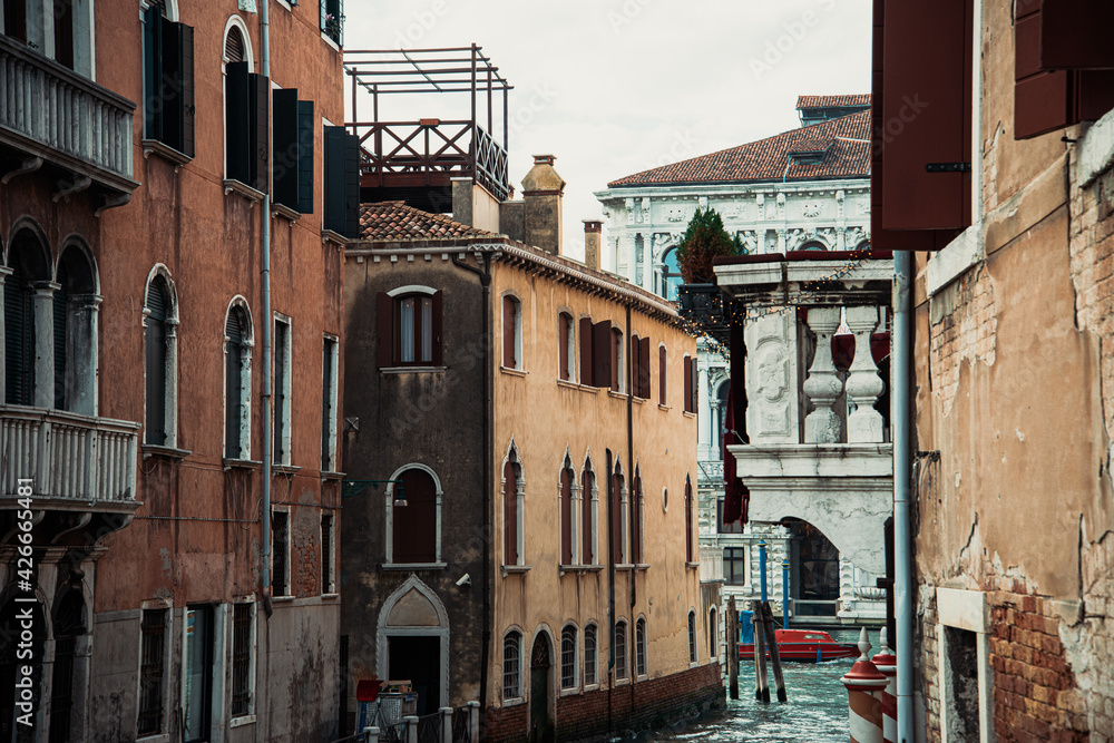 View of water street and old buildings in Venice, ITALY
