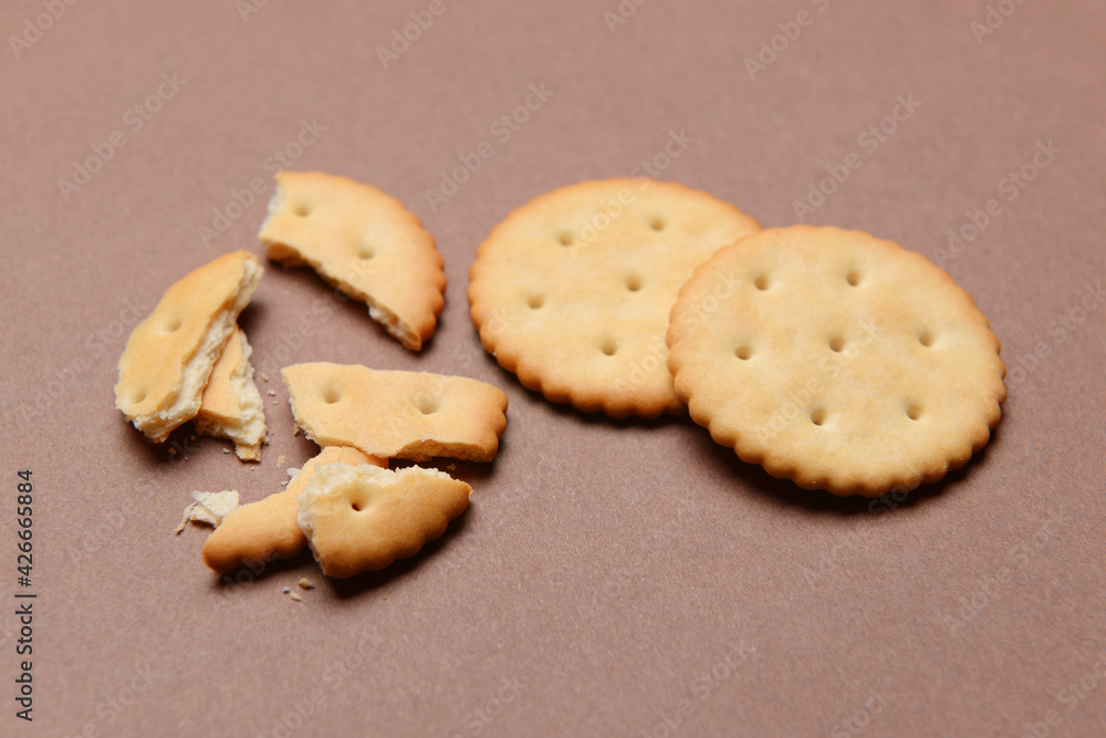 Tasty crackers on color background Tasty crackers on color background