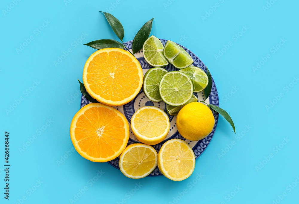 Fresh citrus fruits on color background Fresh citrus fruits on color background