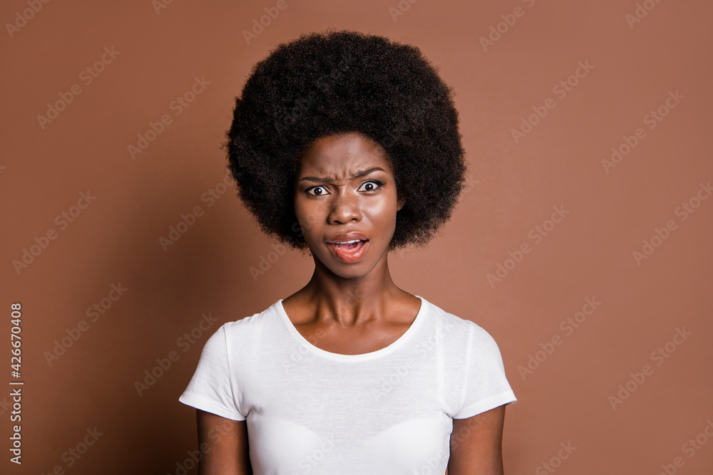 Photo of impressed unsatisfied dark skin person open mouth staring isolated on brown color background