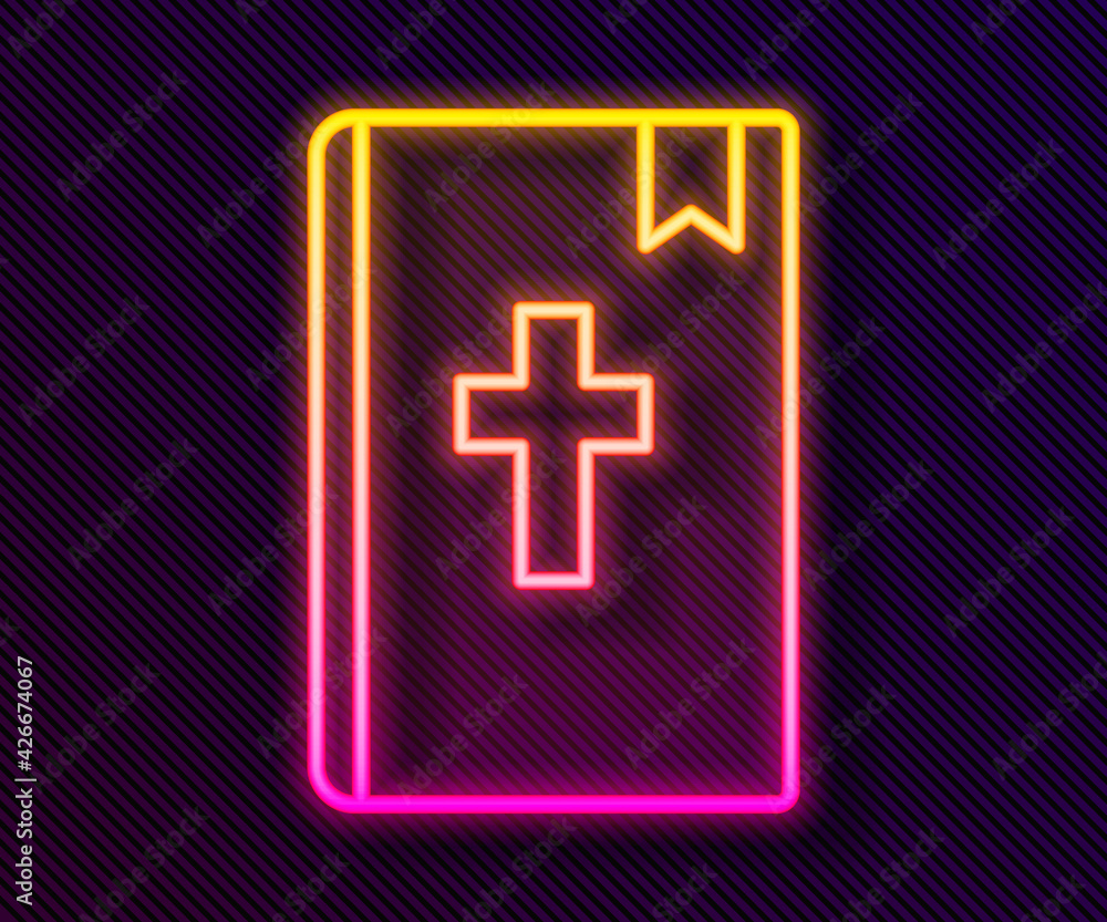 Fototapeta premium Glowing neon line Holy bible book icon isolated on black background. Vector