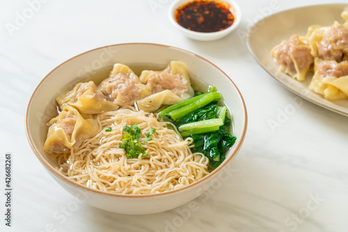 egg noodles with pork wonton soup or pork dumplings soup and vegetable