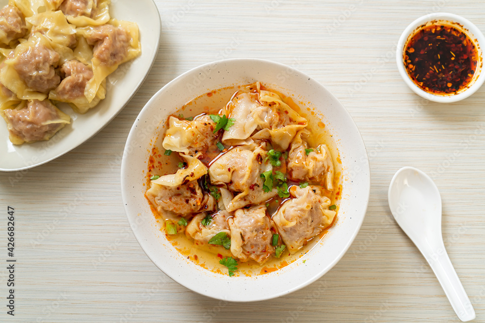 pork wonton soup or pork dumplings soup with roasted chili pork wonton soup or pork dumplings soup with roasted chili