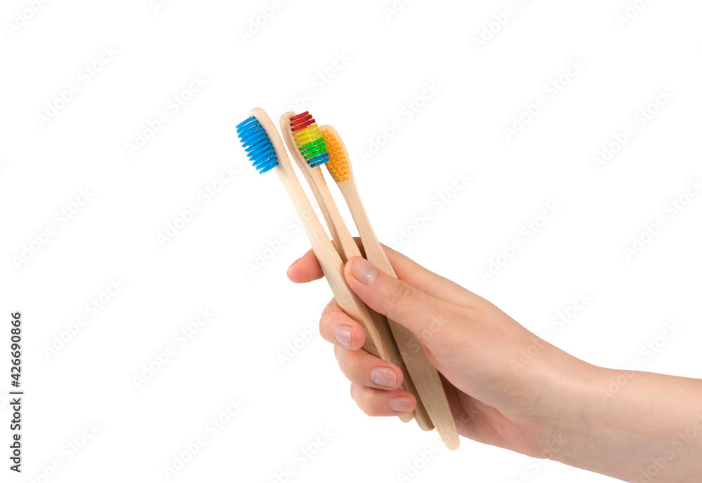 wooden eco friendly bamboo toothbrushes on a white background. Dental care conept wooden eco friendly bamboo toothbrushes on a white background. Dental care conept