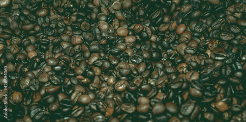 Close up roasted coffee beans background