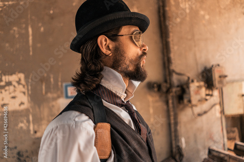 Wallpaper Mural Steampunk. A hero on a river barge surrounded by steel mechanisms. A man with a weapon. Torontodigital.ca