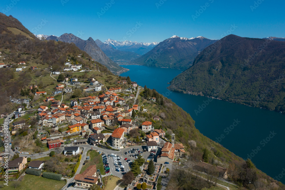 Aerial view of Lugano lake and the Monte Brè village in Canton Ticino in southern Switzerland
