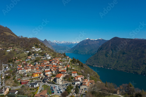 Aerial view of Lugano lake and the Monte Brè village in Canton Ticino in southern Switzerland © alexandre zveiger