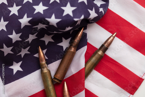 Bullet ammunition on a United states stars and stripes flag