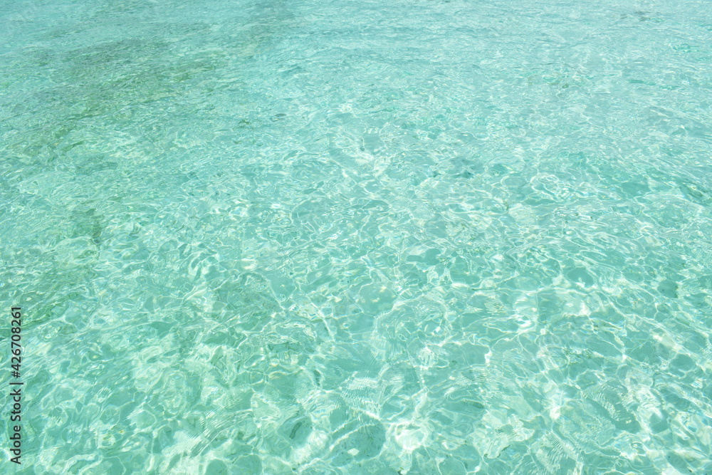 clear sea water surface on sunny day background and texture clear sea water surface on sunny day background and texture
