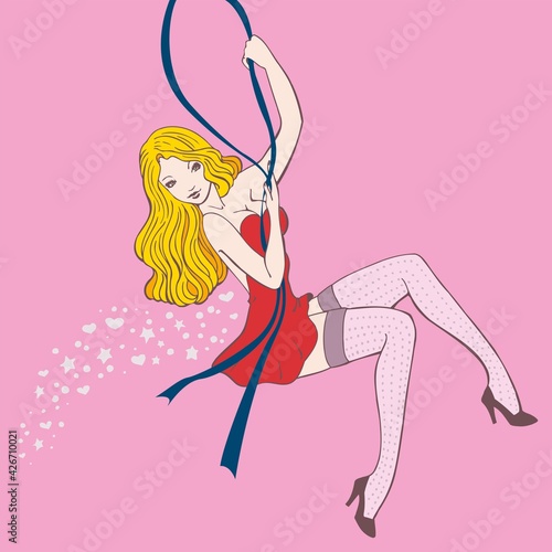 Pin up girl swinging hanging from a ribbon with blonde hair and a red dress 