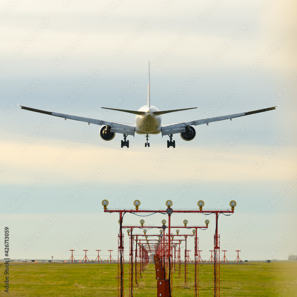 passenger plane on landing line at the airport in Vancouver, Canada. passenger plane on landing line at the airport in Vancouver, Canada.